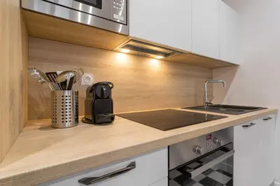 Cuisine ou kitchenette dans l'établissement DIFY Vitton - Masséna