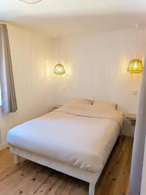 Un ou plusieurs lits dans un hébergement de l'établissement La Tour - Appartement rénové, calme et confortable