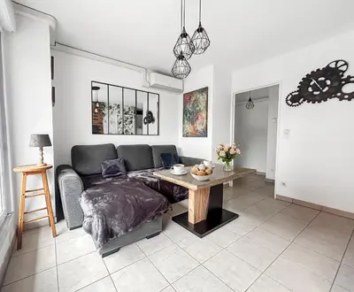 Coin salon dans l'établissement Appartement Avec Grande Terrasse Proche du Centre