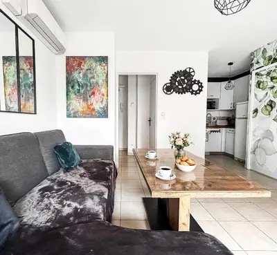 Coin salon dans l'établissement Appartement Avec Grande Terrasse Proche du Centre