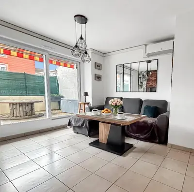 Coin salon dans l'établissement Appartement Avec Grande Terrasse Proche du Centre