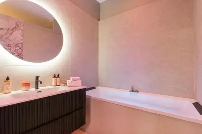 Salle de bains dans l'établissement Host Inn Velvy Suite