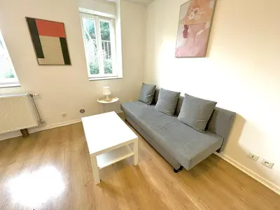 Coin salon dans l'établissement Spacious 1 bedroom apartment - Free parking around