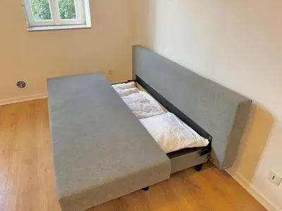 Un ou plusieurs lits dans un hébergement de l'établissement Spacious 1 bedroom apartment - Free parking around