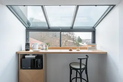 Cuisine ou kitchenette dans l'établissement Le Petit Canut - T1 sous les toits avec vue