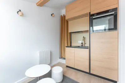 Cuisine ou kitchenette dans l'établissement Le Petit Canut - T1 sous les toits avec vue