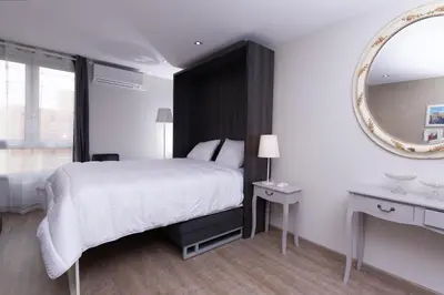 Un ou plusieurs lits dans un hébergement de l'établissement At home in lyon