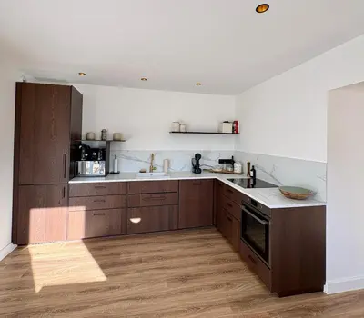 Cuisine ou kitchenette dans l'établissement Maison de campagne Dombes - 6 personnes