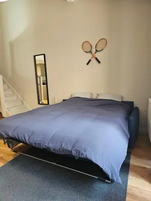 Un ou plusieurs lits dans un hébergement de l'établissement Domaine de la Ferrière, Loft avec Jardin -Climatisation- Parc 3 hectares