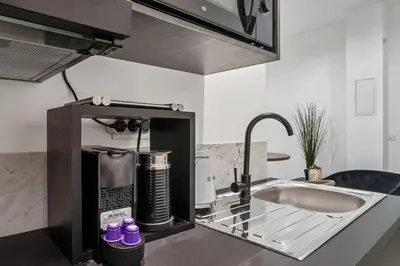 Cuisine ou kitchenette dans l'établissement Pop Cordelier - Appartement idéal au coeur de Lyon