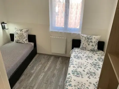 Coin salon dans l'établissement Appartement Sun GroupamaLyon Eurexpo