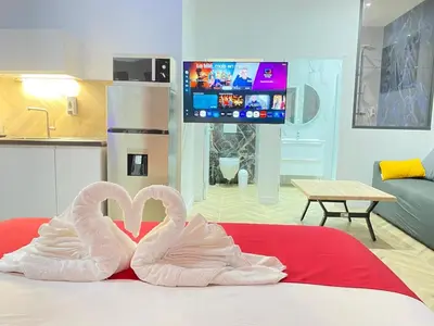 Télévision ou salle de divertissement dans l'établissement La voute des sens