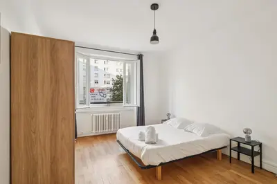 Un ou plusieurs lits dans un hébergement de l'établissement Superbe Appartement T3 - Cosy & Spacieux - Lyon 6e, Brotteaux