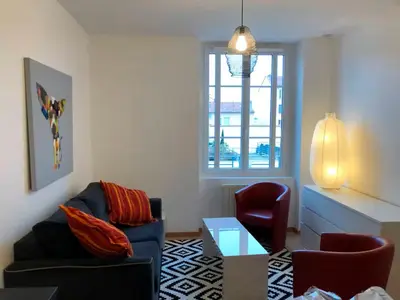 Coin salon dans l'établissement Bel appartement