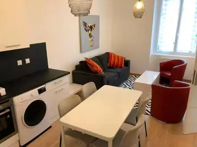 Coin salon dans l'établissement Bel appartement