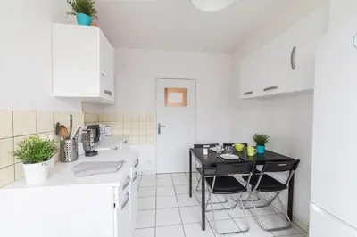 Cuisine ou kitchenette dans l'établissement Proche Vincennes