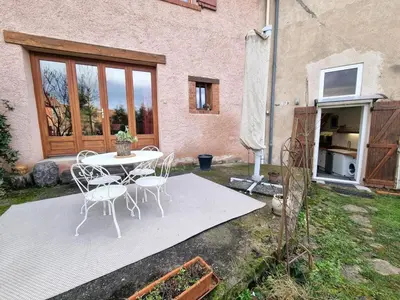 Jardin de l'établissement Maison de village cosy - 4 pers. - FR-1-496-386