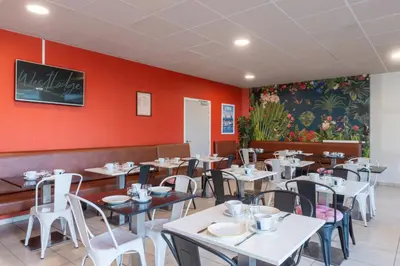 Coin salon dans l'établissement Westlodge Dardilly Lyon Nord