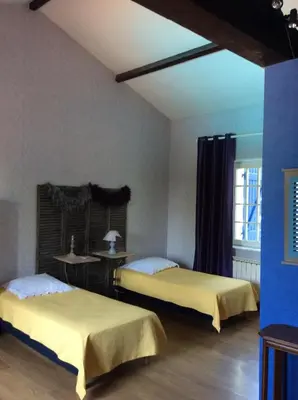 Un ou plusieurs lits dans un hébergement de l'établissement Le Relais Du Grand Logis