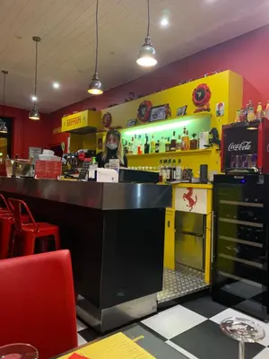 Restaurant ou autre lieu de restauration dans l'établissement hôtel Le Cosy