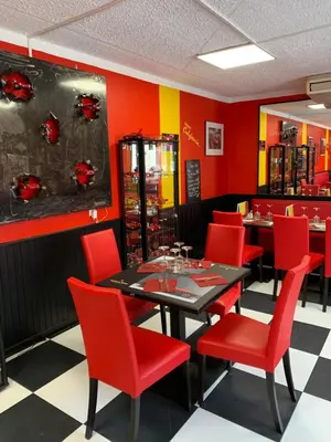Restaurant ou autre lieu de restauration dans l'établissement hôtel Le Cosy