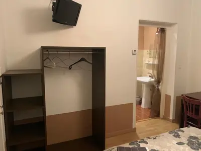 Un ou plusieurs lits dans un hébergement de l'établissement hôtel Le Cosy