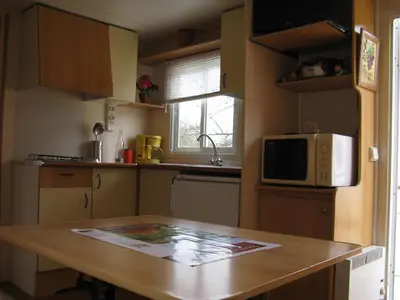 Cuisine ou kitchenette dans l'établissement Le Marverand