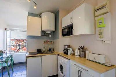 Cuisine ou kitchenette dans l'établissement Lyon Premium- Nid Cosy