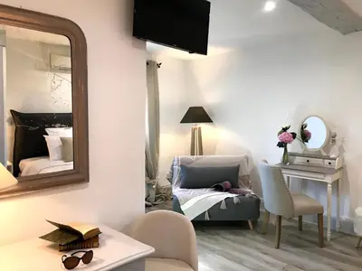 Un ou plusieurs lits dans un hébergement de l'établissement HOSTELLERIE DES BICHONNIERES