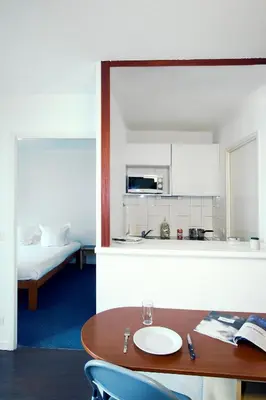 Cuisine ou kitchenette dans l'établissement Séjours & Affaires Lyon Saint-Nicolas
