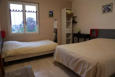 Un ou plusieurs lits dans un hébergement de l'établissement Hotel Restaurant De La Roche