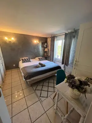 Un ou plusieurs lits dans un hébergement de l'établissement Villa Chapulay