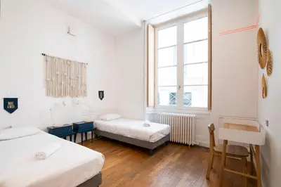 Un ou plusieurs lits dans un hébergement de l'établissement SLO Hostel Lyon les Pentes