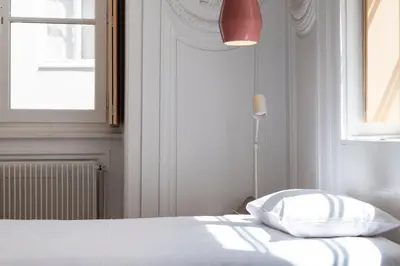 Un ou plusieurs lits dans un hébergement de l'établissement SLO Hostel Lyon les Pentes