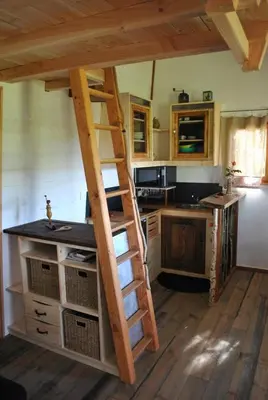 Cuisine ou kitchenette dans l'établissement L'Etournelle - Cabane Perchée