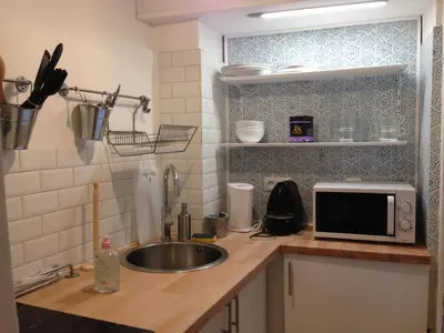Cuisine ou kitchenette dans l'établissement La Suite Presqu'Ile