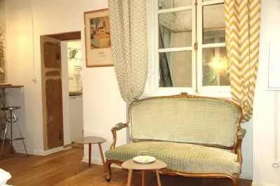 Coin salon dans l'établissement La Suite Presqu'Ile