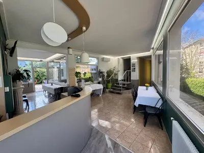 Coin salon dans l'établissement Hôtel Au Val De Saône Free Parking