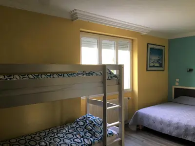 Un ou plusieurs lits dans un hébergement de l'établissement Hôtel Au Val De Saône Free Parking