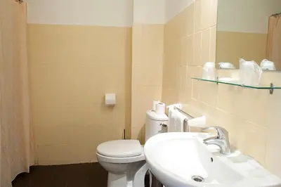 Salle de bains dans l'établissement Hôtel des Facultés