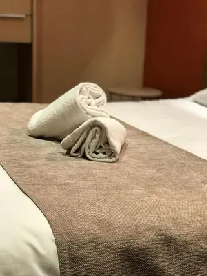 Un ou plusieurs lits dans un hébergement de l'établissement Hotel de Bretagne