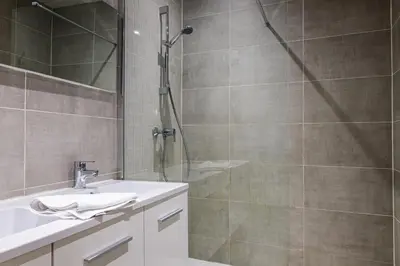 Salle de bains dans l'établissement Hotel Du Dauphiné