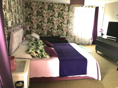 Un ou plusieurs lits dans un hébergement de l'établissement Les Chambres d'Hôtes d'Alice Dior
