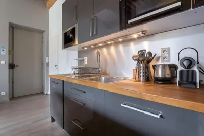 Cuisine ou kitchenette dans l'établissement Pearl - Furnished apartment - Downtown Lyon