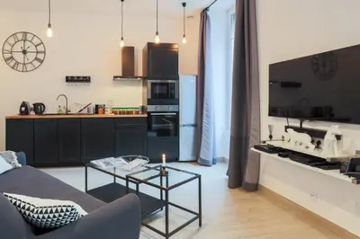 Cuisine ou kitchenette dans l'établissement Suite Garibaldi Cosy et Design