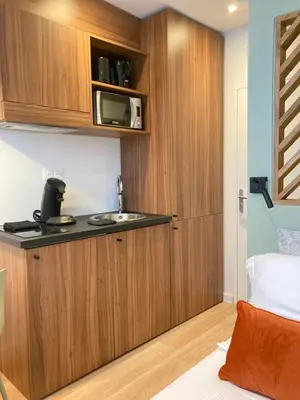 Cuisine ou kitchenette dans l'établissement Studios Part-Dieu Gare - HomaLyon