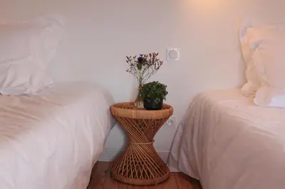 Un ou plusieurs lits dans un hébergement de l'établissement Eclosion Château Hôtel & Restaurant
