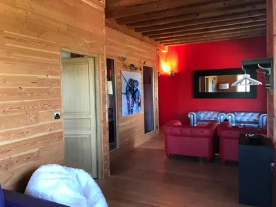 Coin salon dans l'établissement Domaine du Mont Monnet - Chambre d'hôtes & Gîte