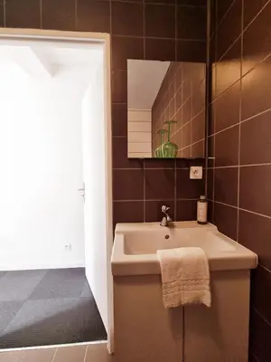 Salle de bains dans l'établissement Le Terminus