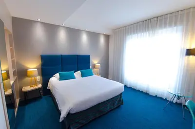 Un ou plusieurs lits dans un hébergement de l'établissement Best Western Plus Hotel Plaisance